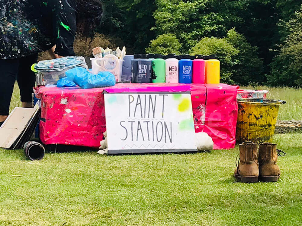 Paint station at art team building event