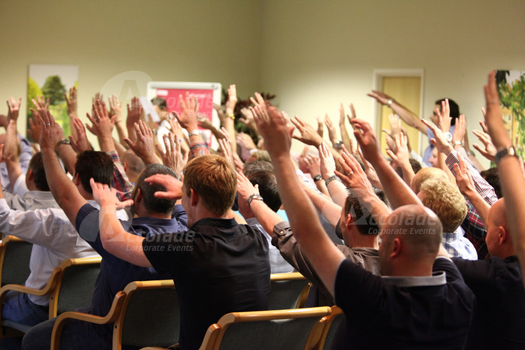 Body percussion energiser with peoples hands in the air