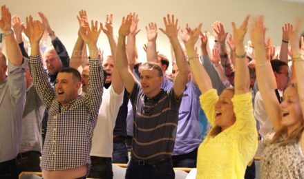 People standing up with hands in the air Body percussion energiser