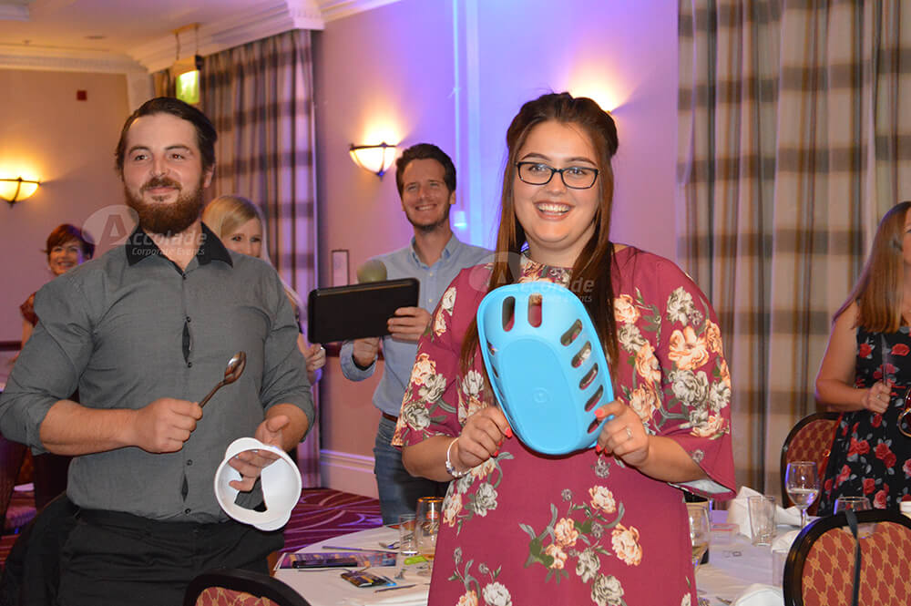 Lady playing kitchen instrument Crashing Waiters corporate event