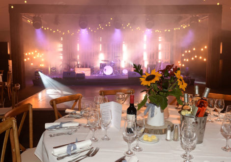 Country Chic Corporate Event Sunflowers and Stage Lighting