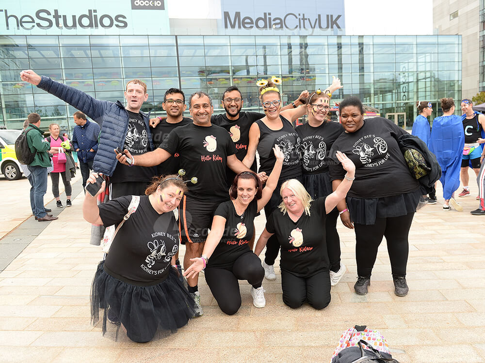 Team happily posing at Media City Manchester for It's a Knockout team corporate event