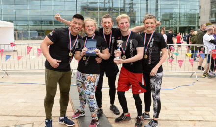 Winning team outside Media City Manchester for It's a Knockout NHS team building event