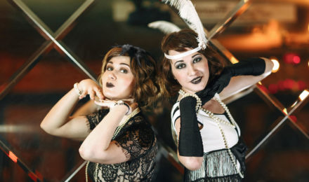 Two ladies at a Speakeasy themed company party