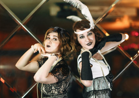 Two ladies at a Speakeasy themed company party