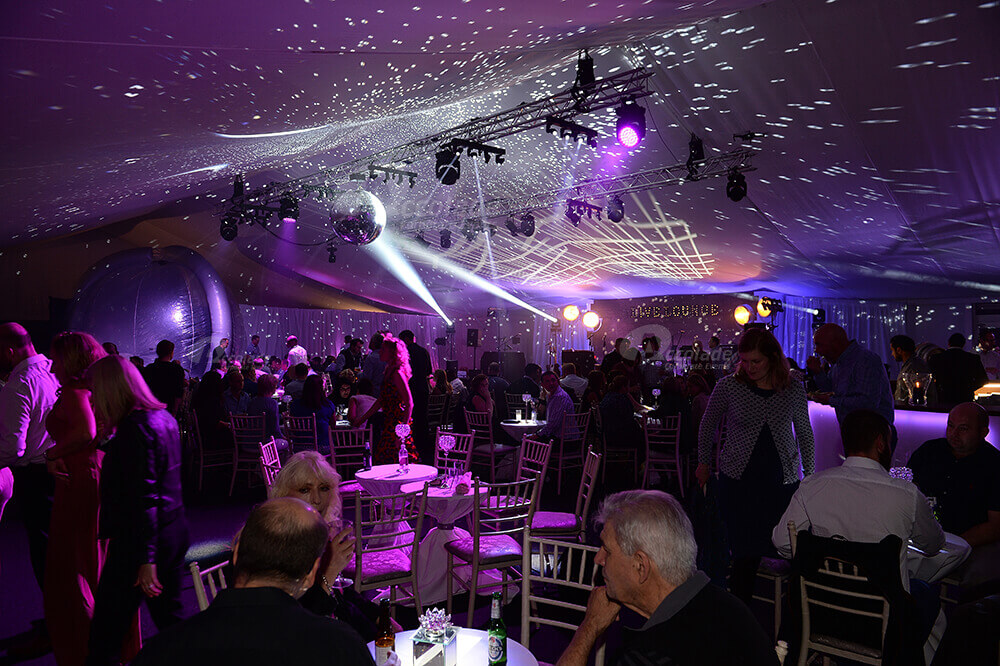 Glitter ball radiating around the room at an evening corporate event