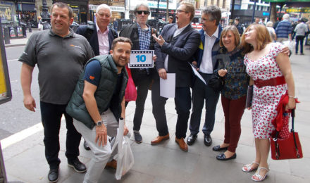 Team posing for photo on a company treasure hunt