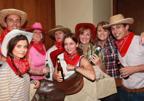 Group Around Saddle Wild West Party Event