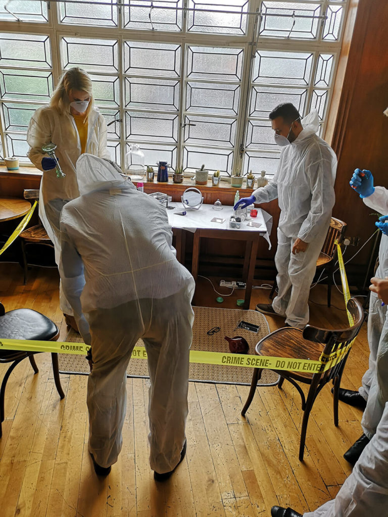 Dusting for fiingerprints at team building event